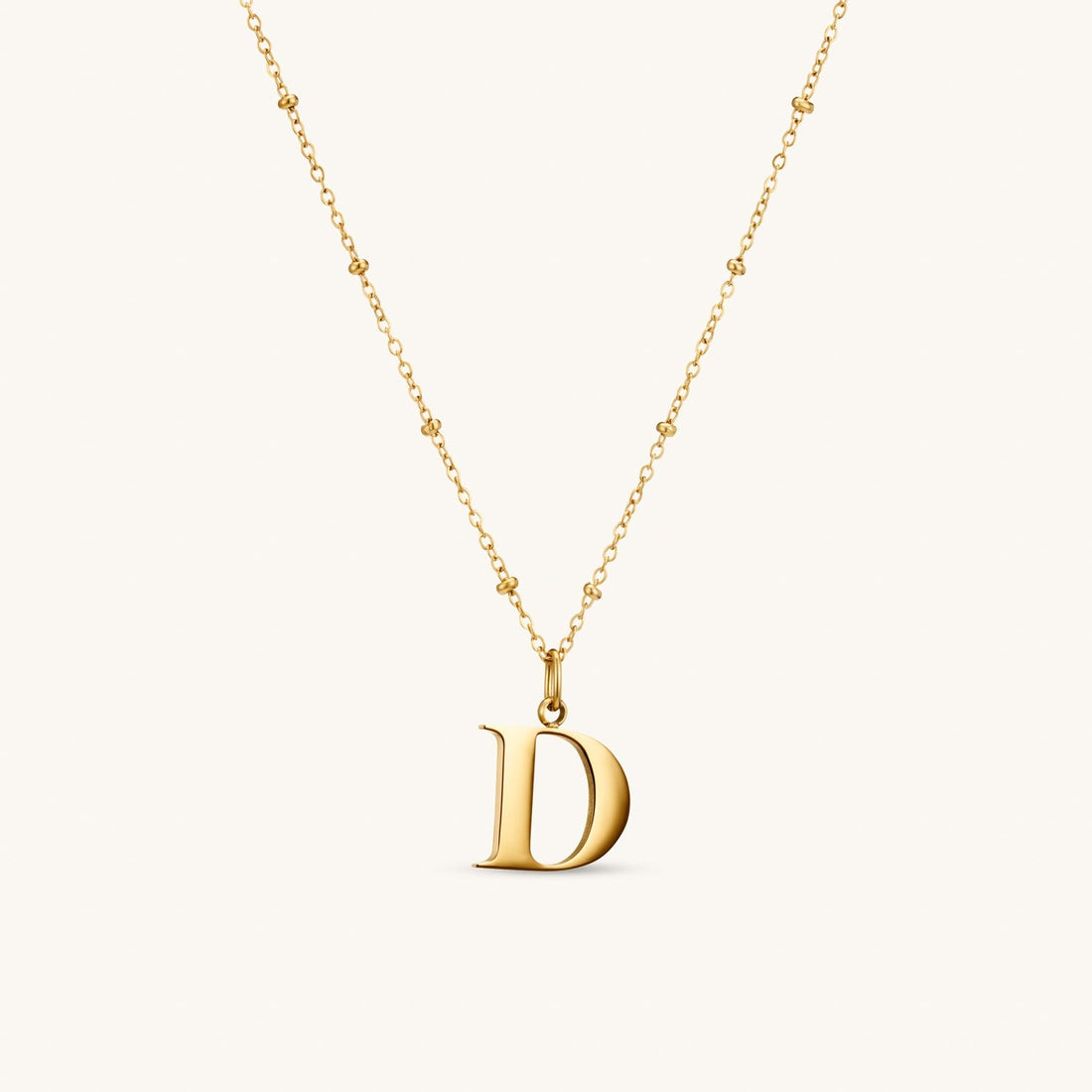 D Initial Necklace In Gold
