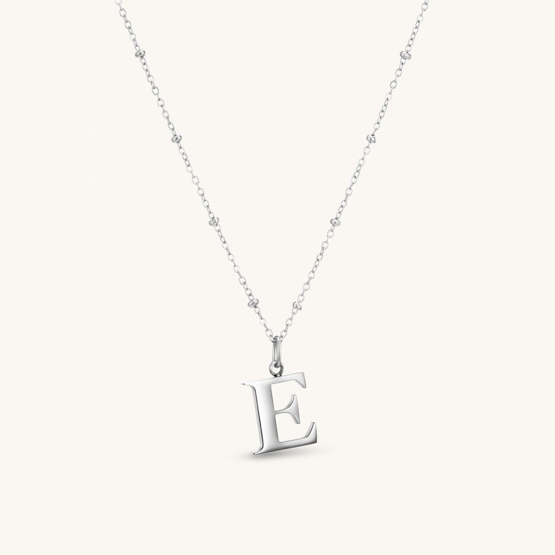 E Initial Necklace In Silver