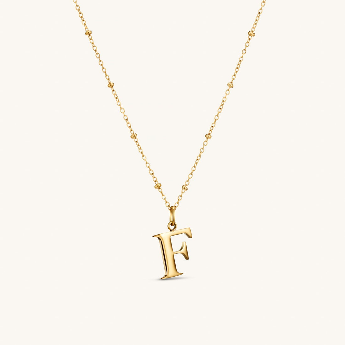 F Initial Necklace In Gold
