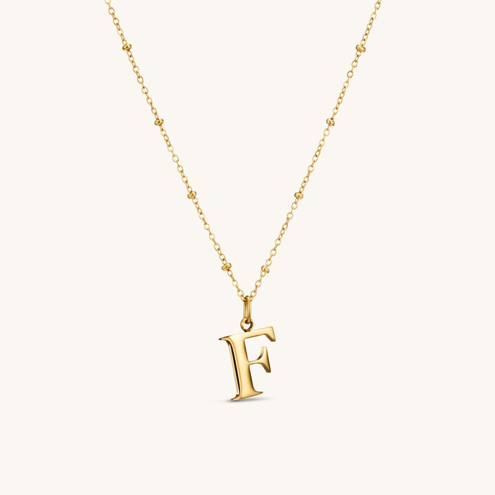 F Initial Necklace In Gold
