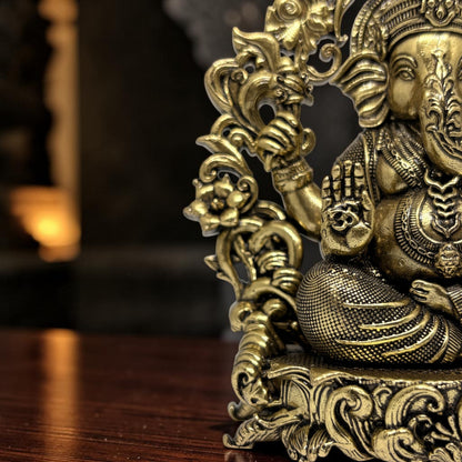 Brass Ganapati with Floral Arch