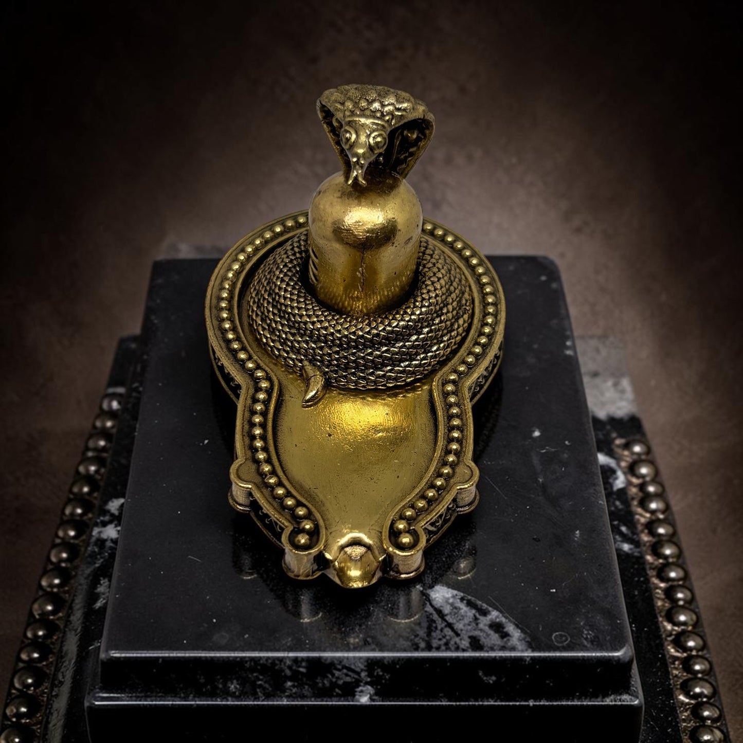 Swayambhu: Brass Shiv Lingam with Vasuki Nag
