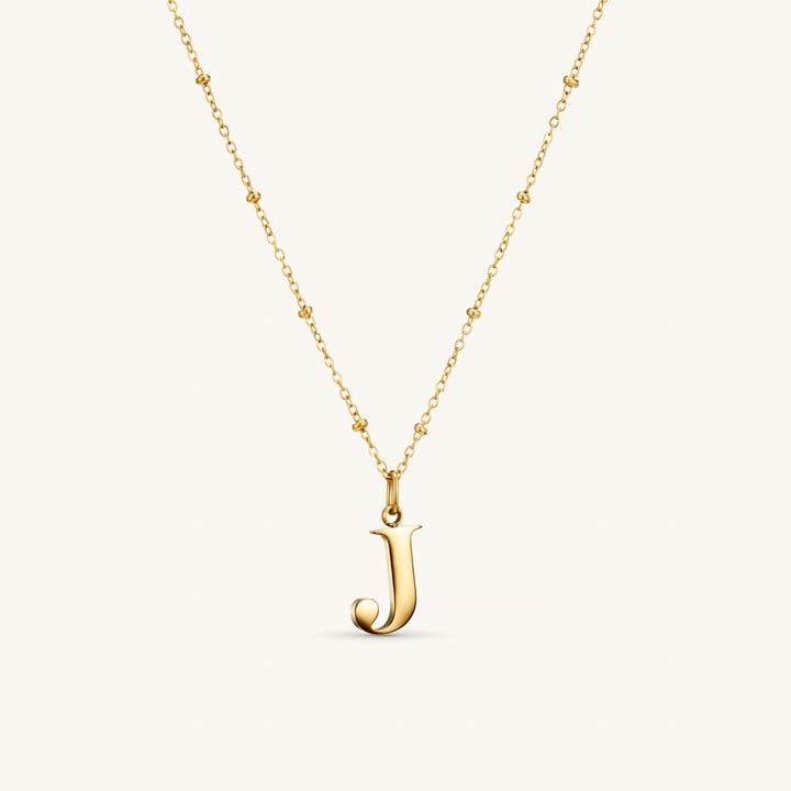 J Initial Necklace In Gold
