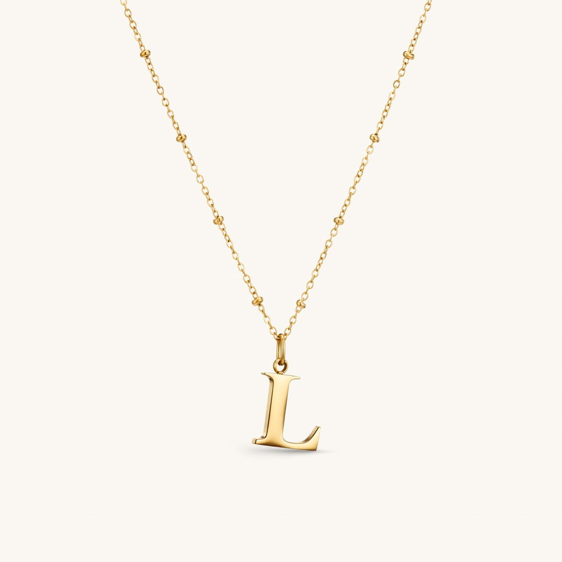 L Initial Necklace In Gold
