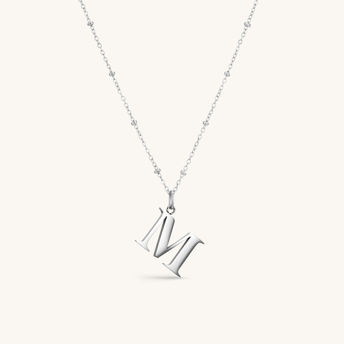 M Initial Necklace In Silver