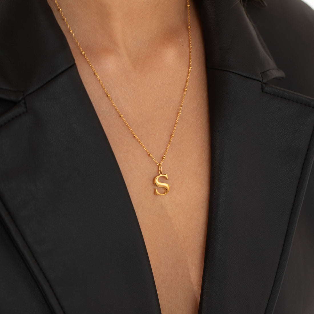 S Initial Necklace In Gold
