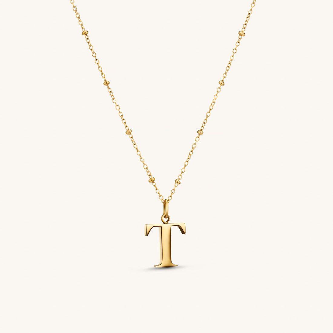 T Initial Necklace In Gold