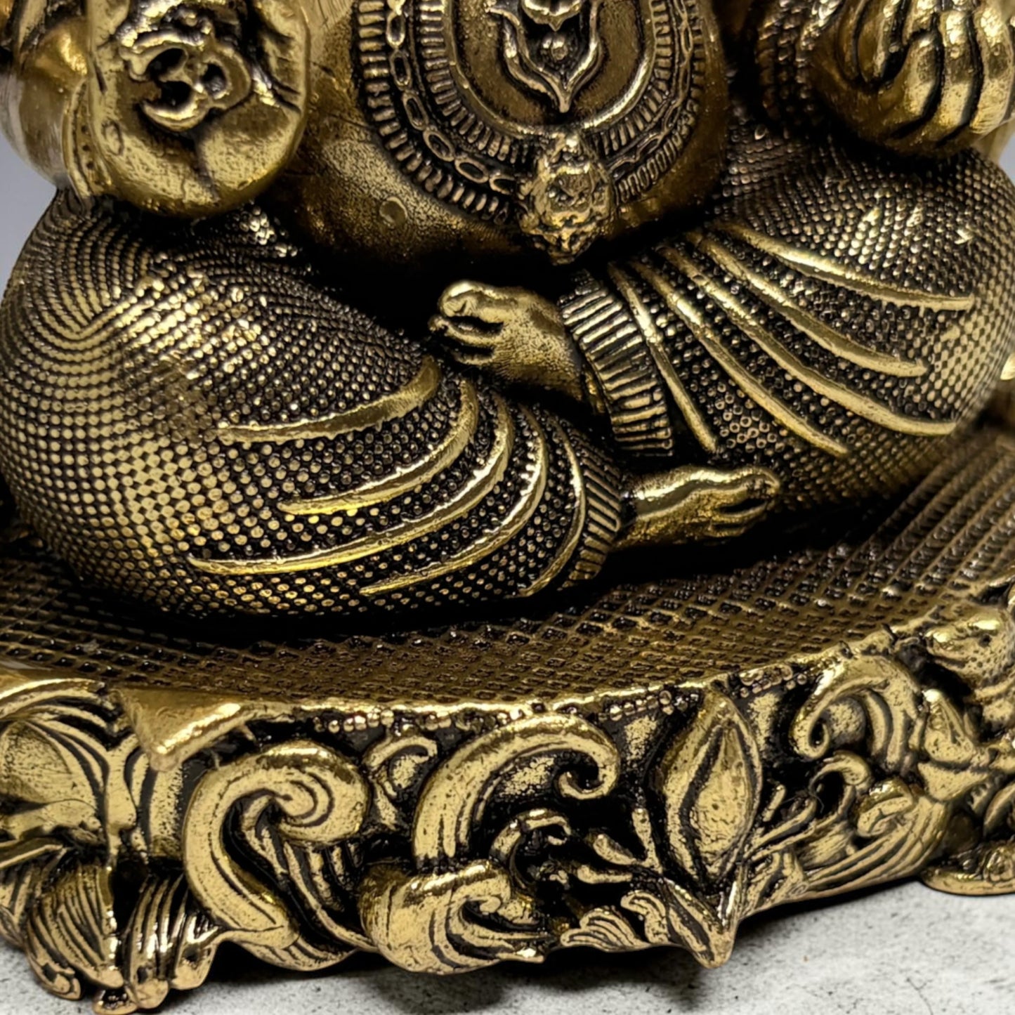 Brass Ganapati with Floral Arch